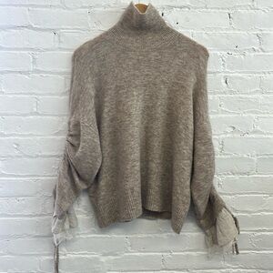 Cinq a sept turtle neck sweater with cute ruffle sleeve detail